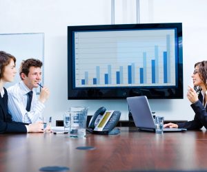 Businesspeople discussing in meeting room. Click here for other business images: